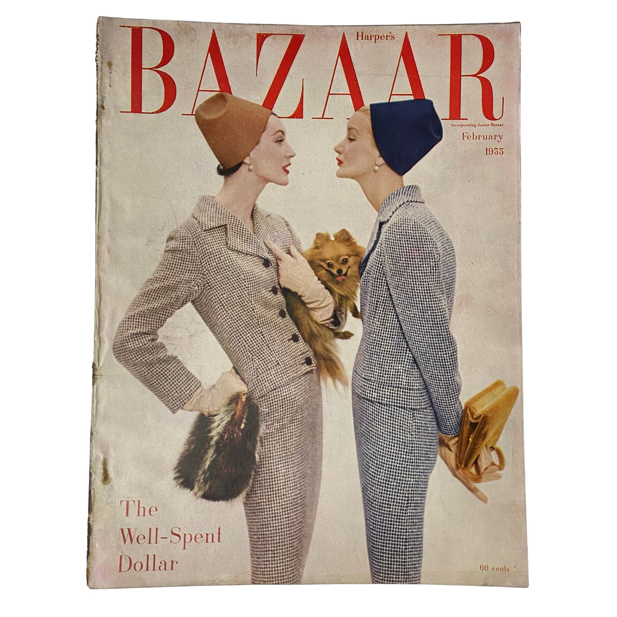 Cover of Harper's Bazaar Magazine February 1955 featuring models Dovima and Sunny Harnett wearing stylish hats and outfits, emphasizing the theme 'The Well-Spent Dollar.'
