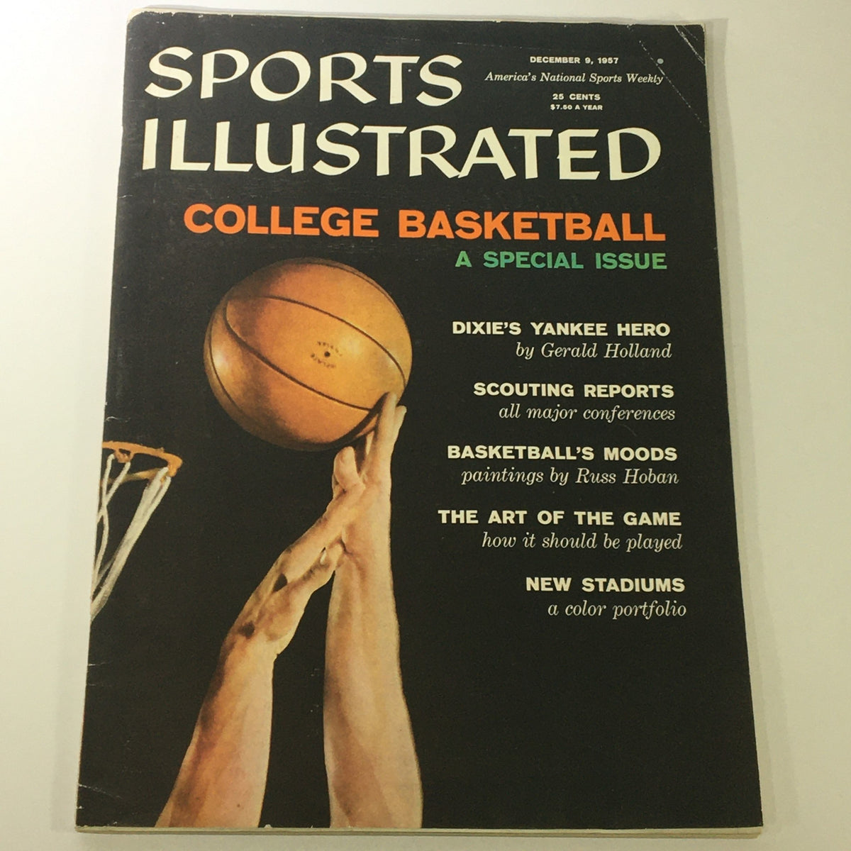 VTG Sports Illustrated Magazine from December 9, 1957 featuring 'Dixie's Yankee Hero' cover story on college basketball, showcasing a basketball and a player's hand.