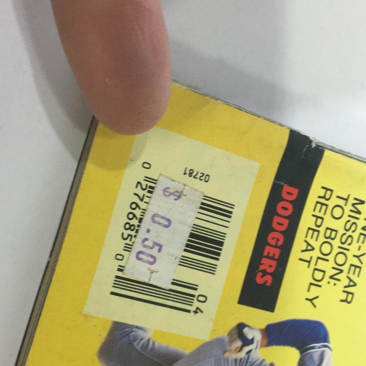 Close-up of the price sticker on the back cover of the VTG Sport Baseball Preview Magazine April 1989, indicating a price of $0.50 and featuring the Dodgers logo.