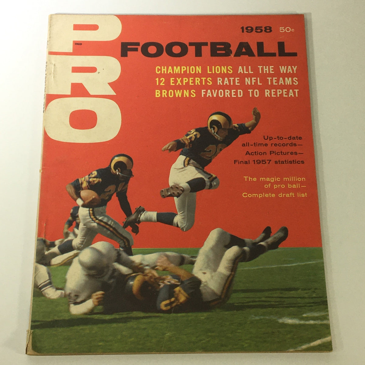 VTG Pro Football Magazine 1958 featuring Jon Arnett and Tom Wilson, showcasing exciting football action on a vibrant red cover, perfect for collectors.