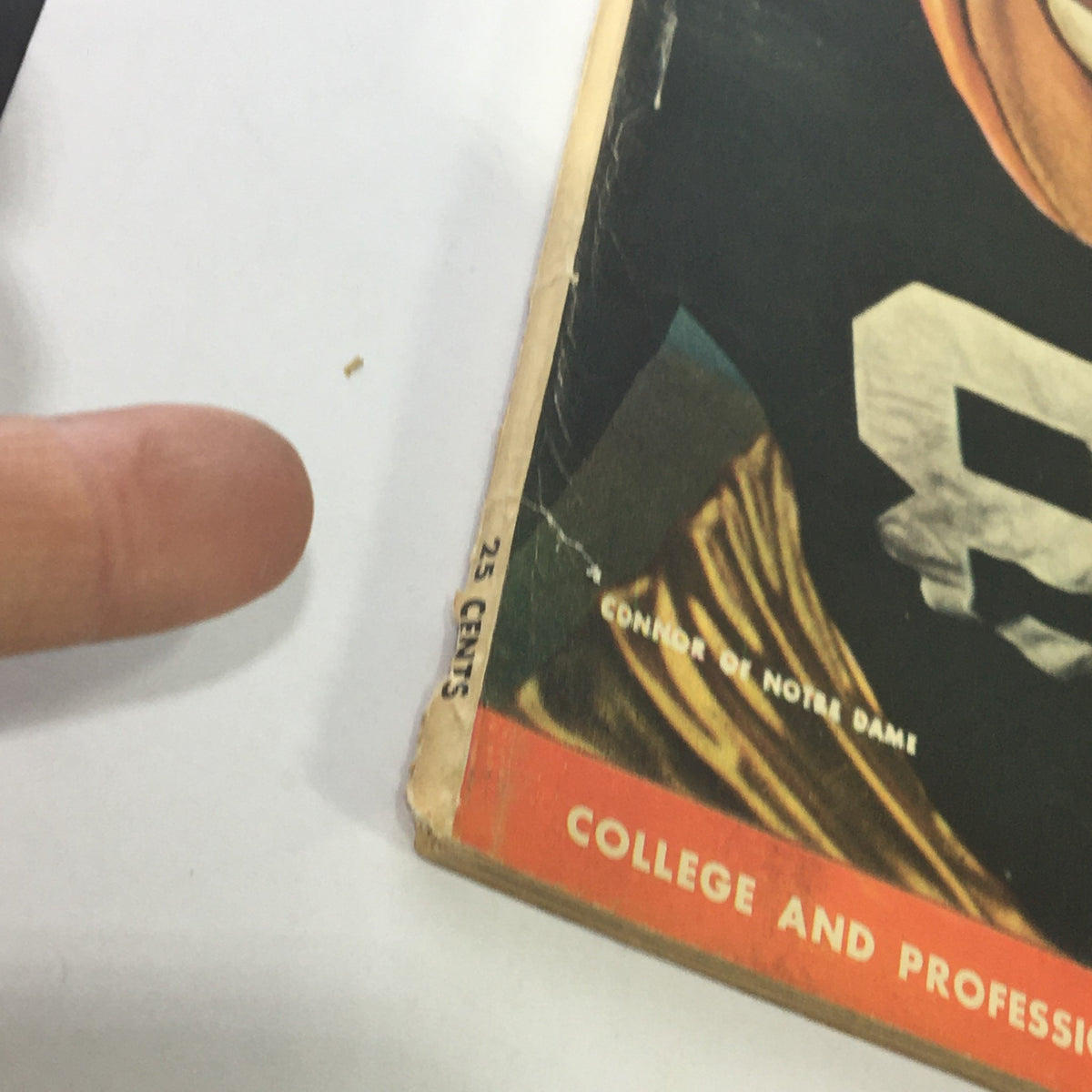Close-up view of the edge of Street & Smith's Football Pictorial Yearbook 1947, showcasing the vintage appeal and condition of the magazine.