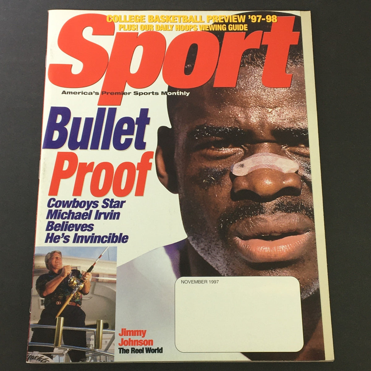 Cover of Sport Magazine November 1997 featuring Jimmy Johnson and Cowboy Star Michael Irvin. The headline reads 'Bullet Proof' emphasizing Michael Irvin's invincibility. This vintage magazine showcases the dynamic world of sports during the late 1990s.