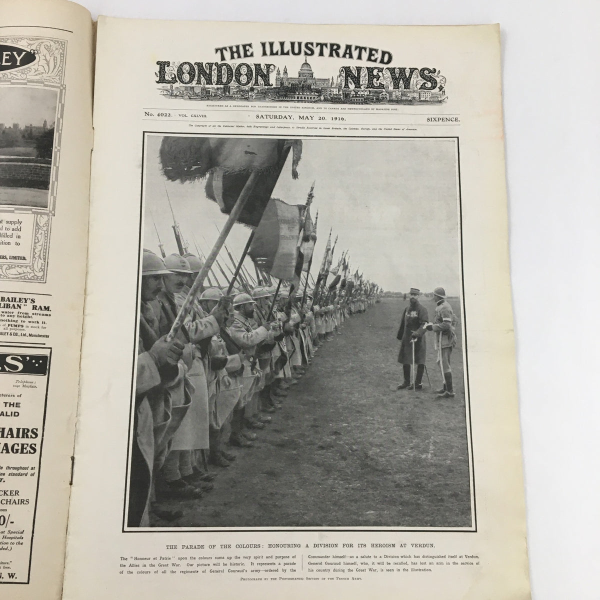 Cover of The Illustrated London News May 20 1916, featuring a historical illustration of soldiers marching in formation, honoring a division for its heroism during World War I.