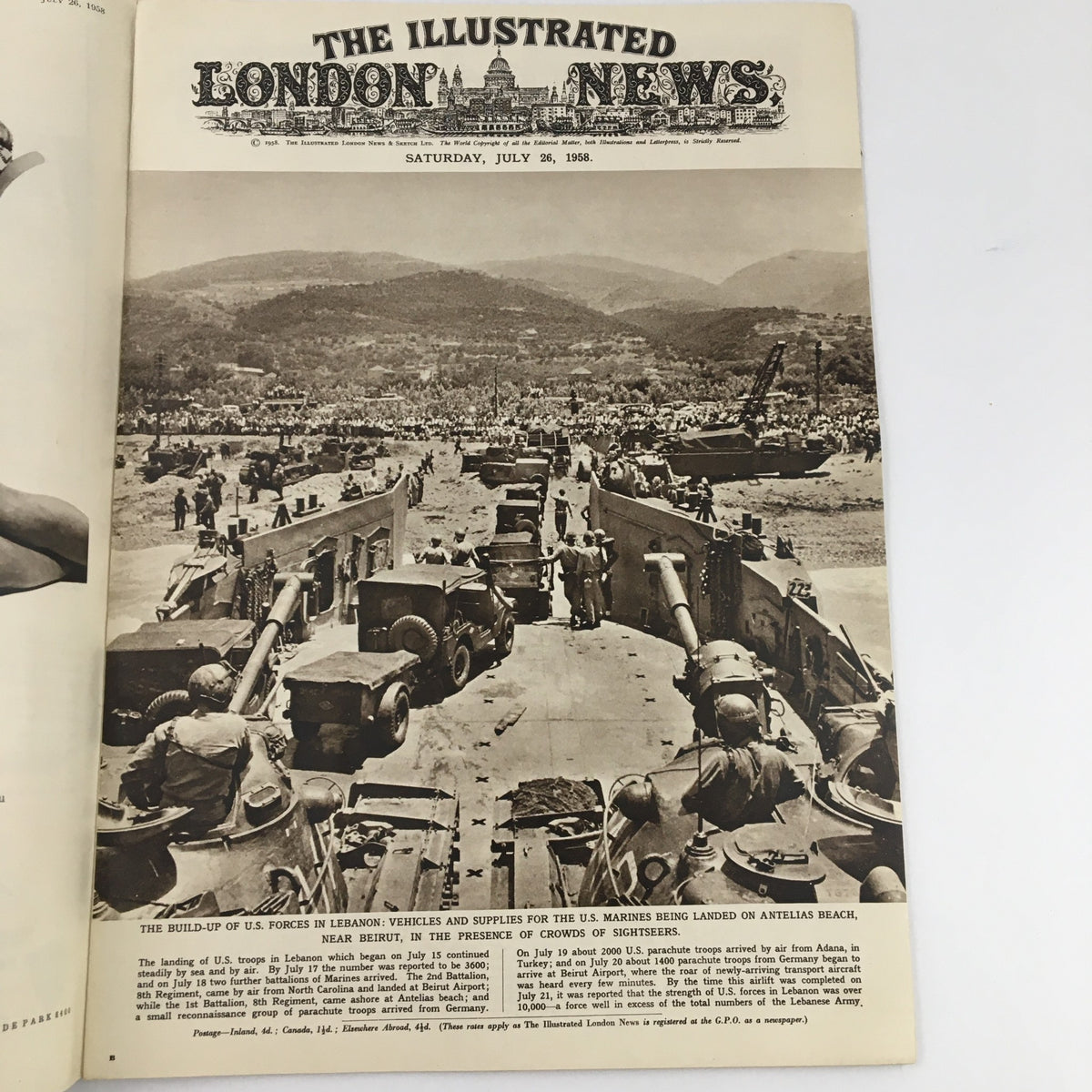 Cover image of The Illustrated London News from July 26 1958 showing the build-up of U.S. Forces in Lebanon with military vehicles and personnel on the beach.