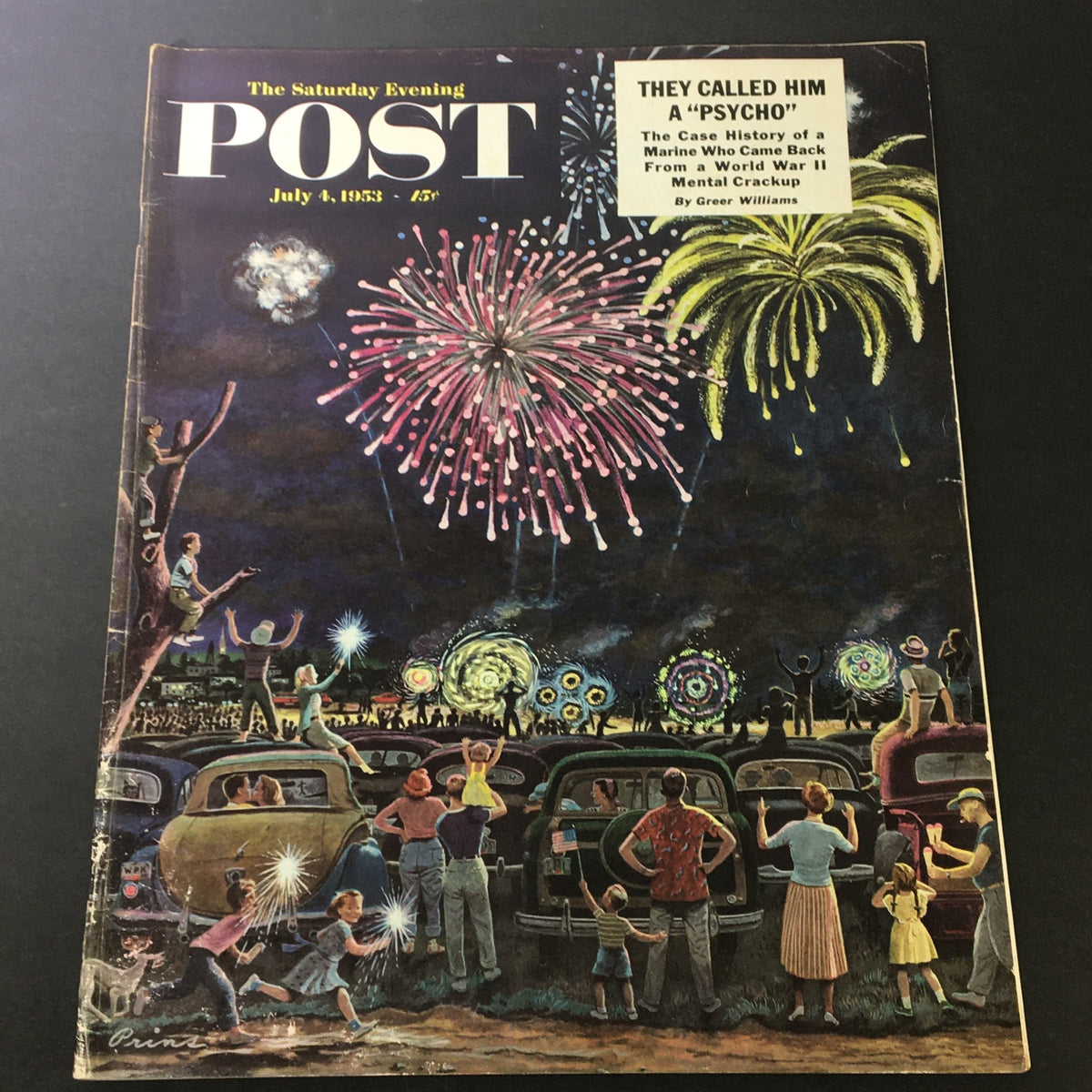 Vintage cover of VTG The Saturday Evening Post July 4 1953 featuring a colorful firework display, showcasing people celebrating under the night sky.