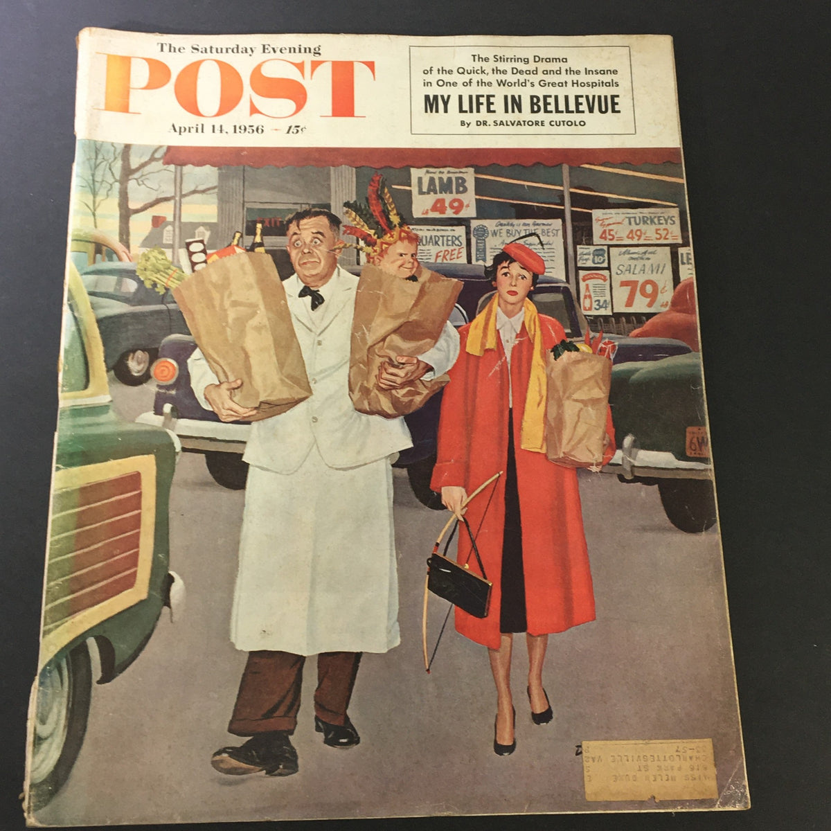 Cover of the Saturday Evening Post April 14, 1956 featuring the title 'My Life in Bellevue' and a vintage illustration depicting a man and woman with grocery bags.