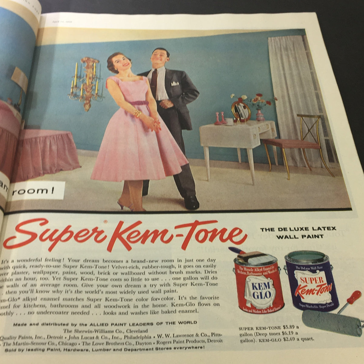 Advertisement for Super Kem-Tone wall paint in the Saturday Evening Post April 14, 1956, showcasing a couple in a well-decorated room.