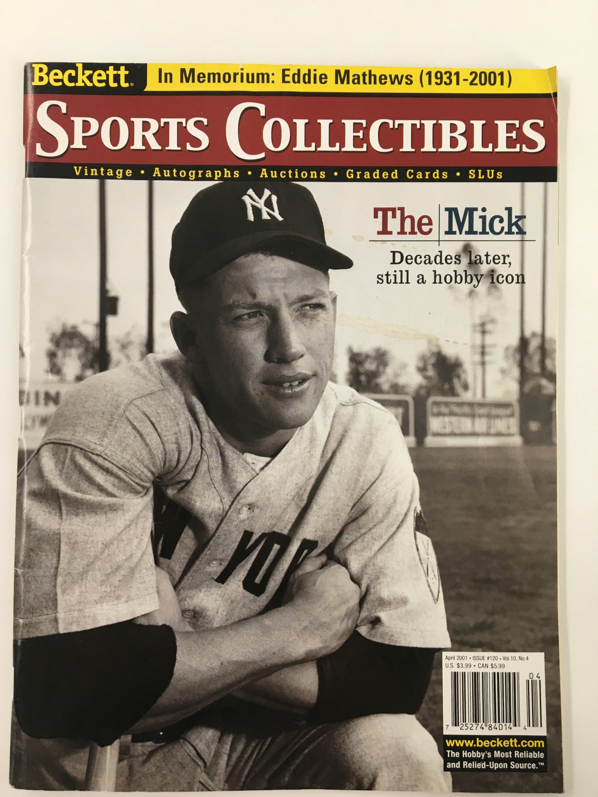 Cover of Beckett Sports Collectibles April 2001 featuring Mickey Mantle, titled 'The Mick: Decades later, still a hobby icon'. The magazine is dedicated to Eddie Mathews, showcasing vintage sports collectibles.
