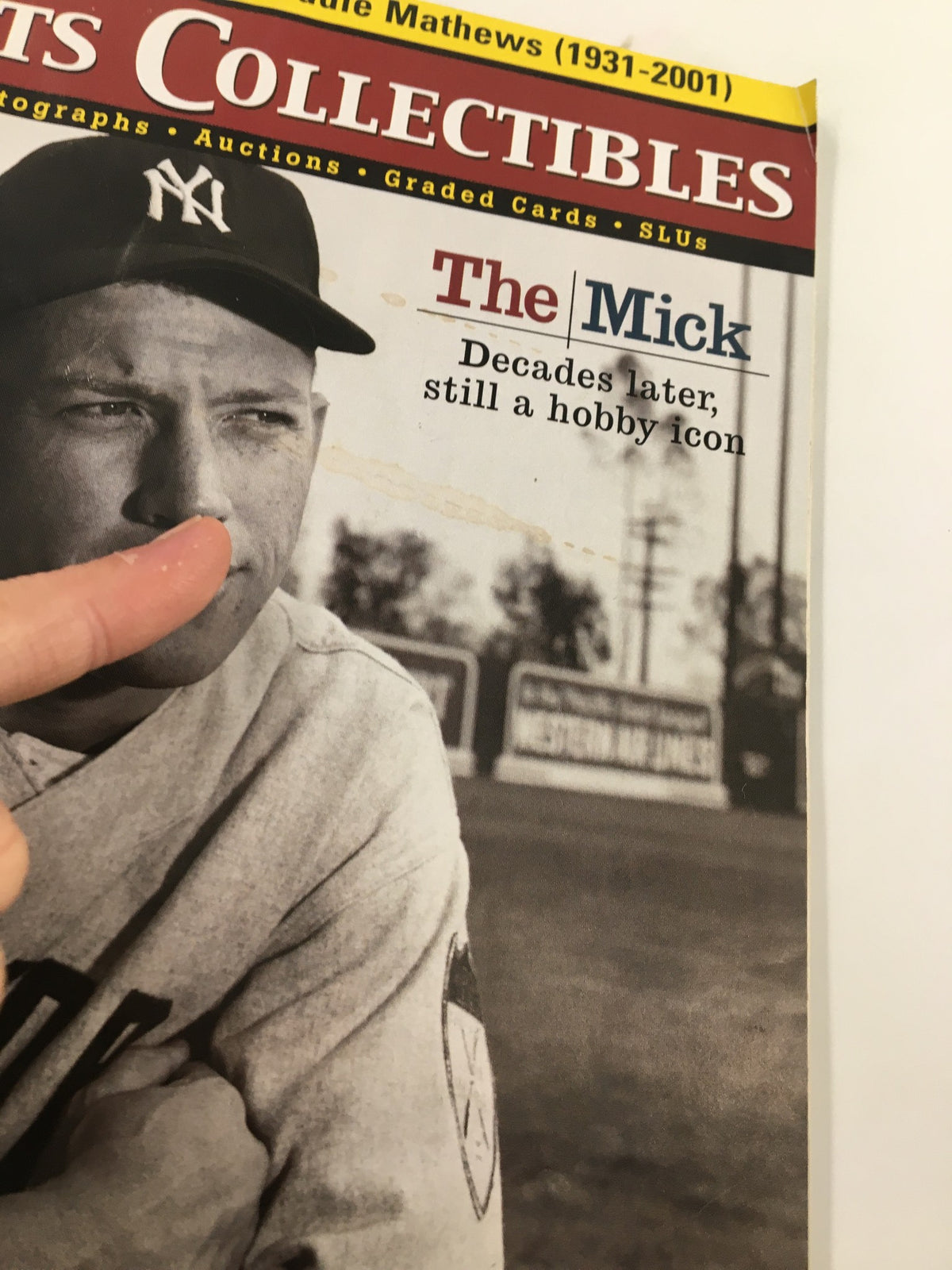 Cover image of Beckett Sports Collectibles April 2001 #120 Mickey Mantle, Ed Mathews, highlighting an iconic photo of Mickey Mantle.