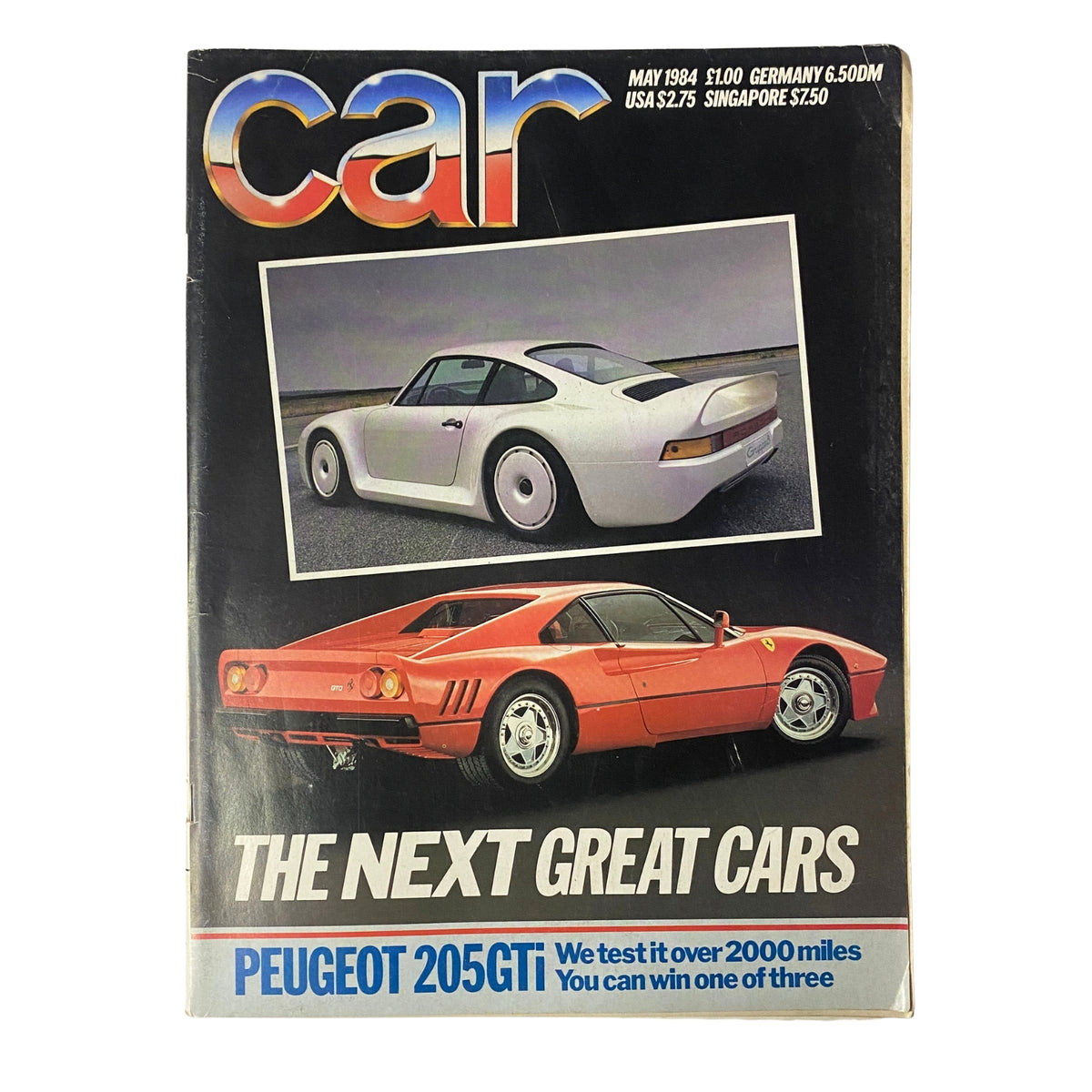 Cover of Car Magazine UK May 1984 featuring the Twin-Turbo Ferrari and Porsche, highlighting the Peugeot 205GTi and showcasing pioneering performance cars. A nostalgic piece for automotive enthusiasts.