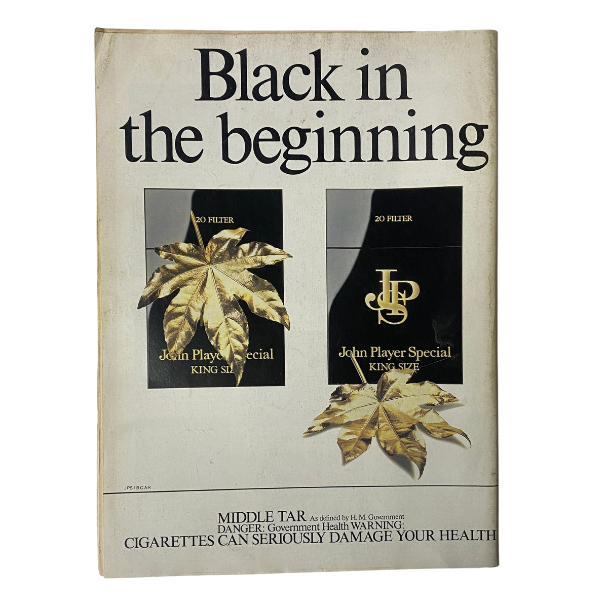 Back cover of Car Magazine UK May 1984 showing an advertisement for John Player Special cigarettes, contrasting the automotive theme of the magazine with a health warning.