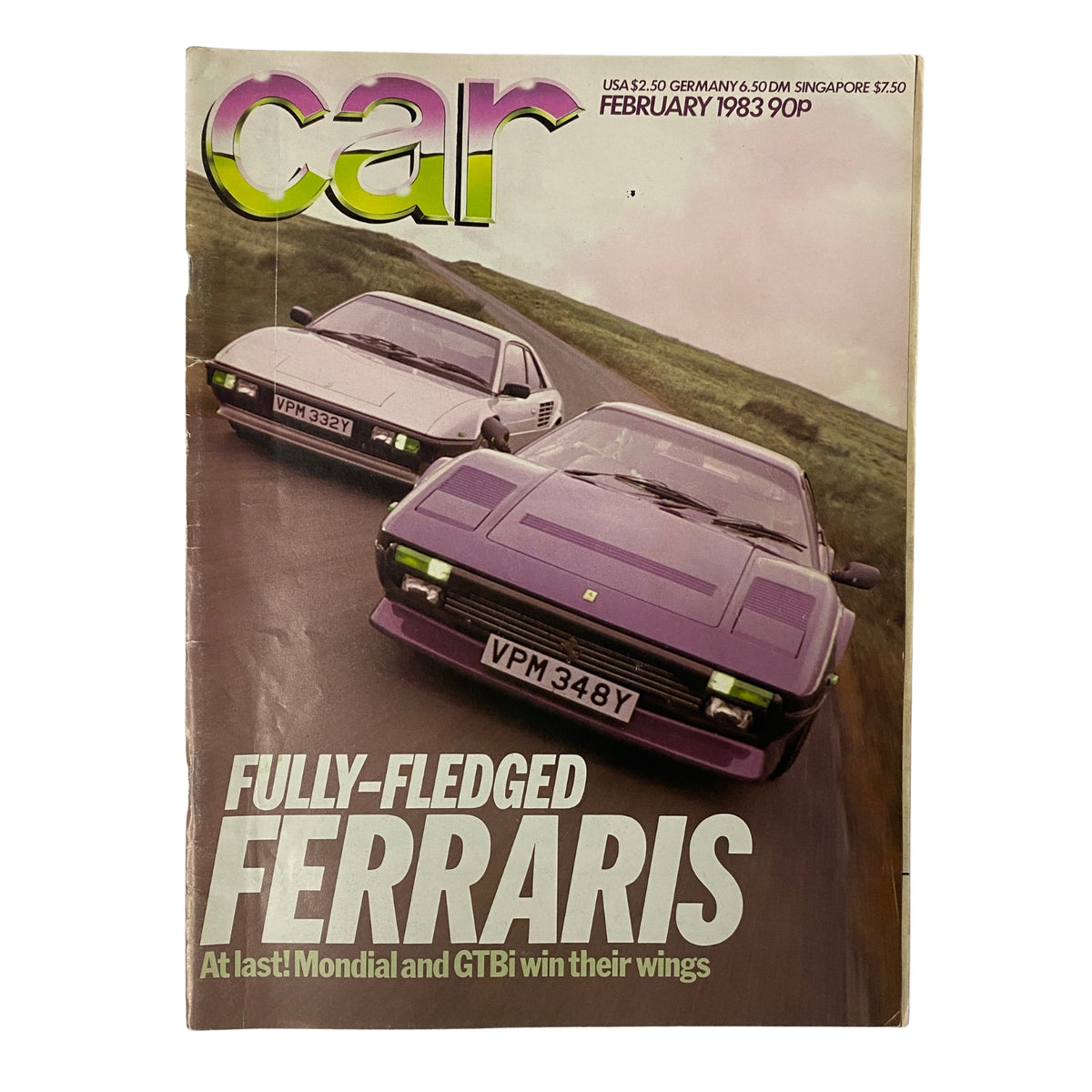 Car Magazine UK Import February 1983 featuring fully-fledged Ferraris, Mondial and GTBi, on the cover showcasing two Ferraris in motion.