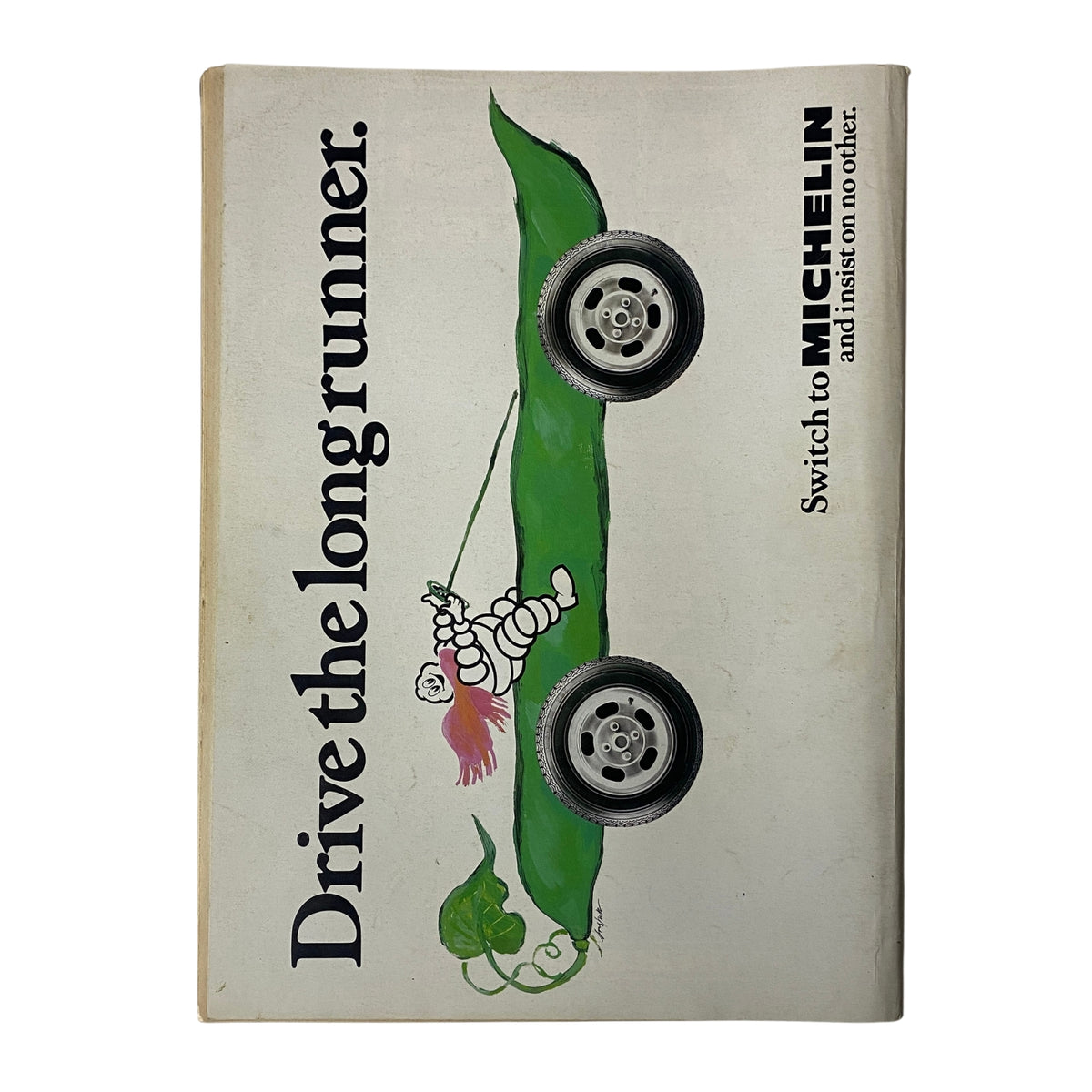 Car Magazine UK March 1983 featuring a unique cover illustration with a playful Michelin character and a stylized car design, highlighting the theme 'Drive the long runner.'
