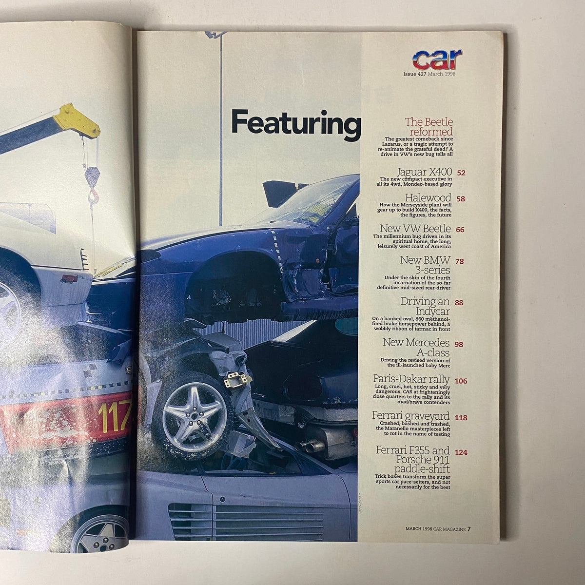 Interior spread from Car Magazine UK March 1998 highlighting featured articles including the new Volkswagen Beetle, Jaguar X400, BMW 3-Series, and Ferrari's Graveyard, with a detailed table of contents.