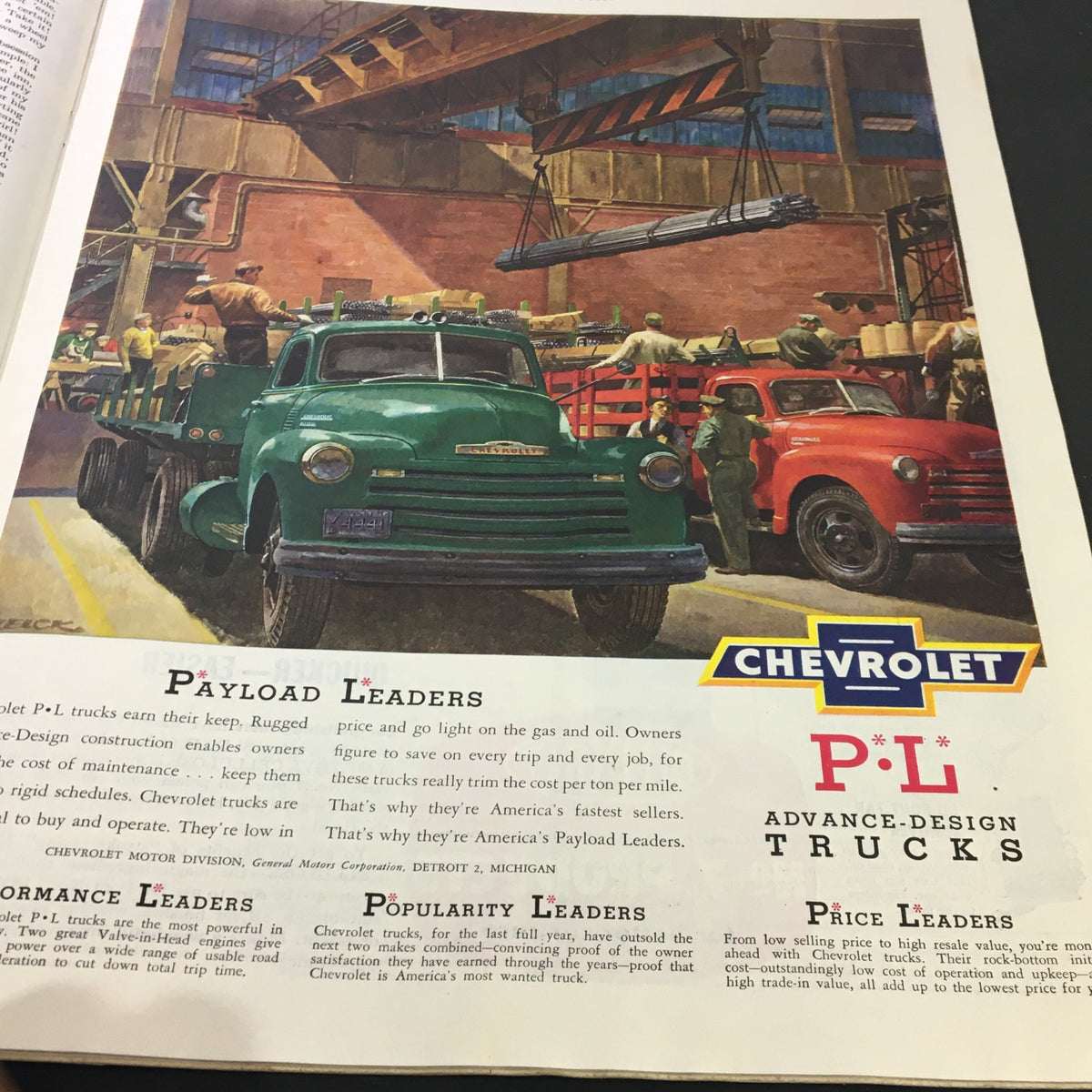 Chevrolet truck advertisement showcasing green and red trucks in a warehouse setting. Image is from The Saturday Evening Post June 10 1950 The Amazing Danny Kaye by Joe Alex Morris.