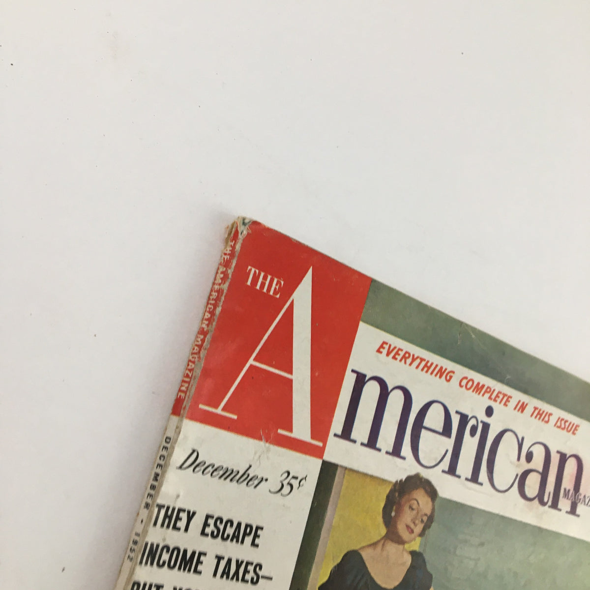 Top view of The American Magazine, December 1952, with the title 'They Escape Income Taxes But You Can't', displaying the magazine's logo and vintage style, reflecting the era's design.