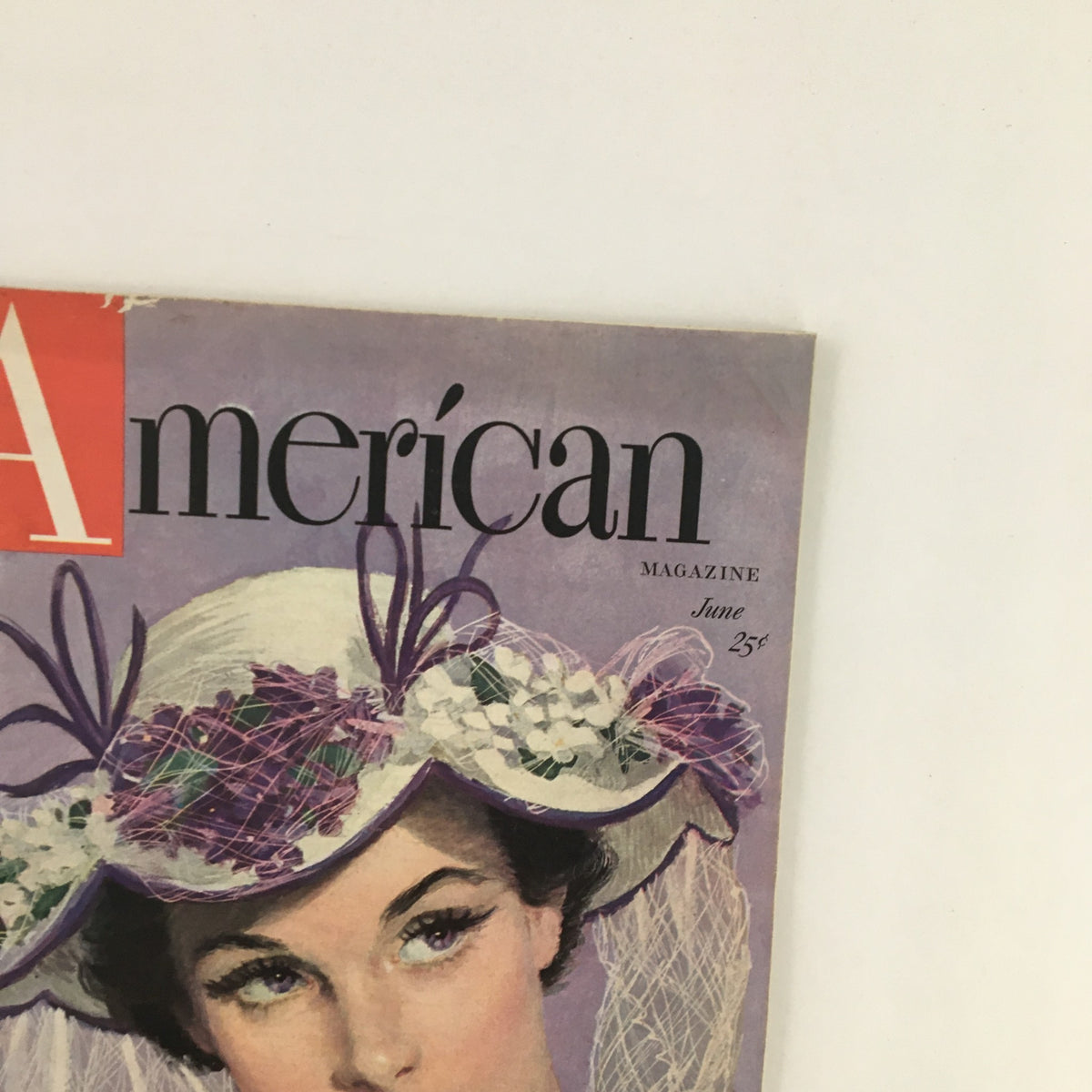 Cover of The American Magazine June 1948 featuring a fashionable woman wearing a stylish hat, showcasing the vintage aesthetic and typography of the era.