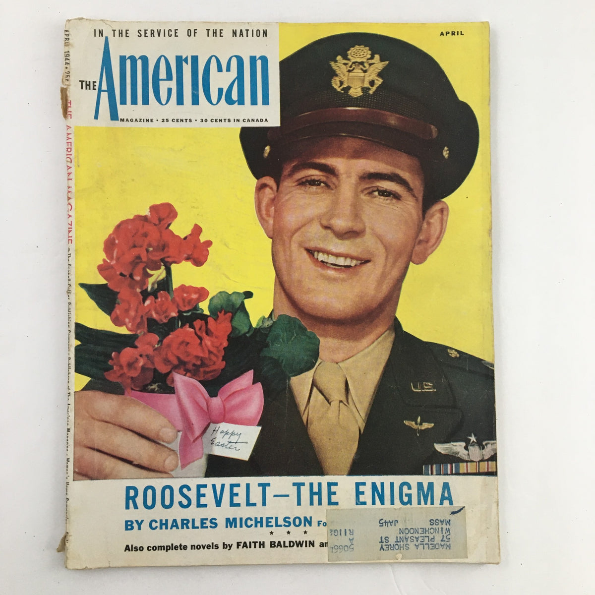 Cover of The American Magazine from April 1944 featuring a smiling Captain W. S. Richmond holding flowers, captured in a vibrant photograph by Paul D'Ome.