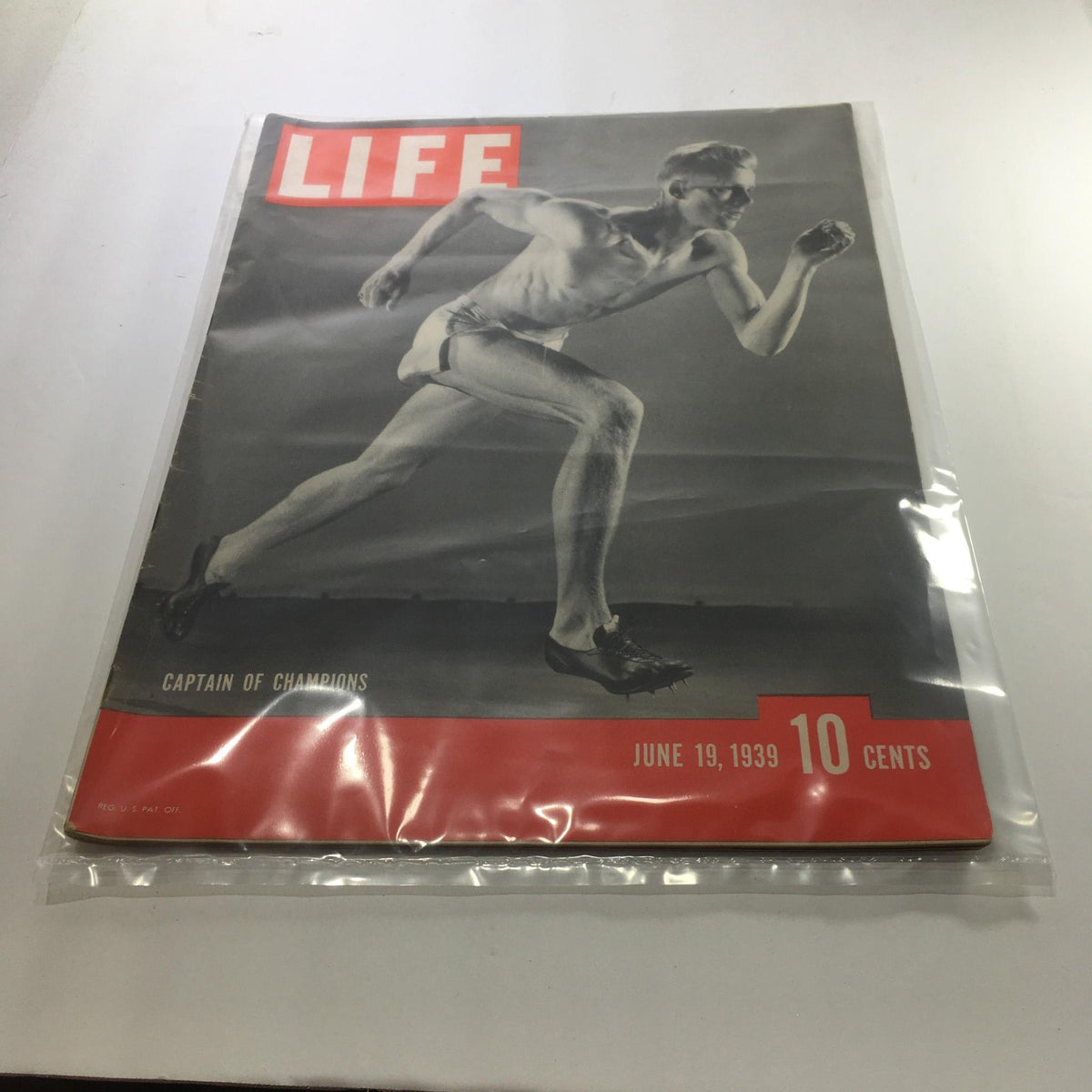 Life Magazine: June 19, 1939 - Captain of Champions, featuring a vintage black and white cover image of an athlete in motion, symbolizing speed and strength. This collectible magazine captures important historical moments and is a must-have for collectors.