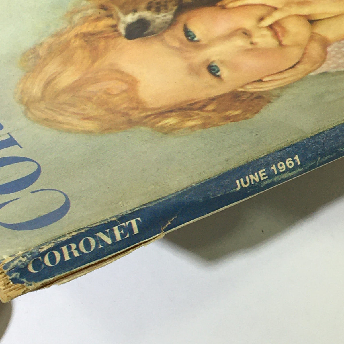 Close-up of the spine of the VTG Coronet Magazine June 1961 Vol 50 #2, highlighting its vintage condition and title.