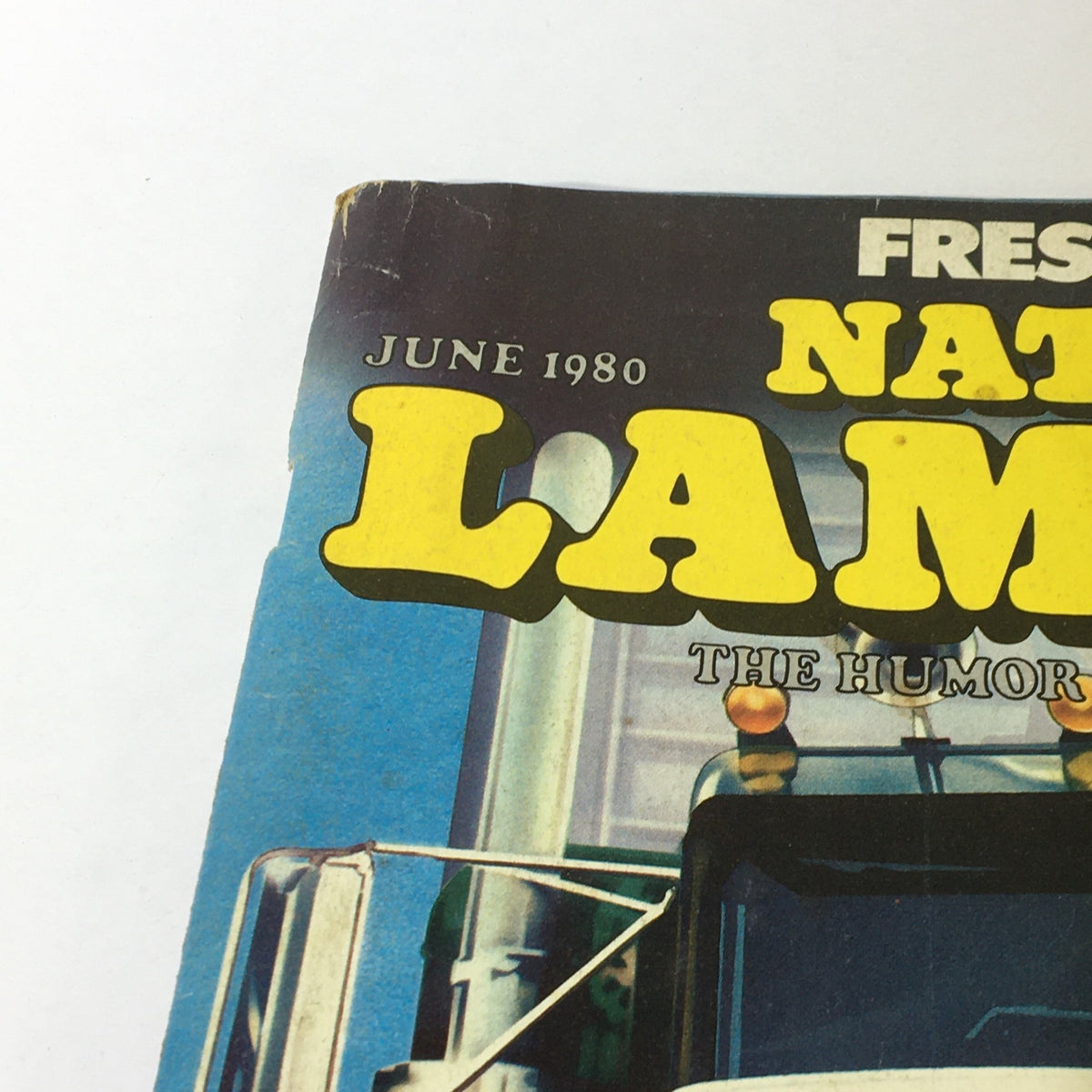 Close-up of the title and publication date on the cover of National Lampoon Magazine June 1980, highlighting the magazine's playful typography and nostalgic feel.