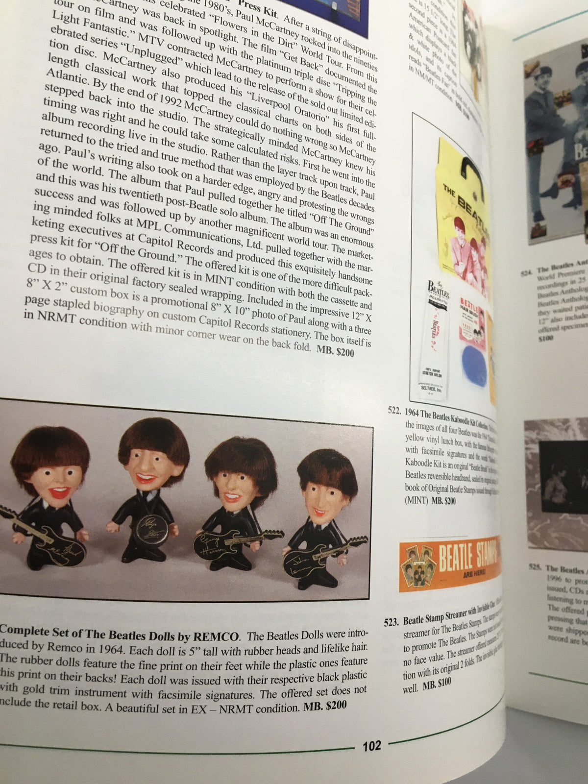 Image from the American Memorabilia Magazine March 2007 showing a vintage set of Beatles dolls and collectible items, emphasizing the nostalgia of classic memorabilia.