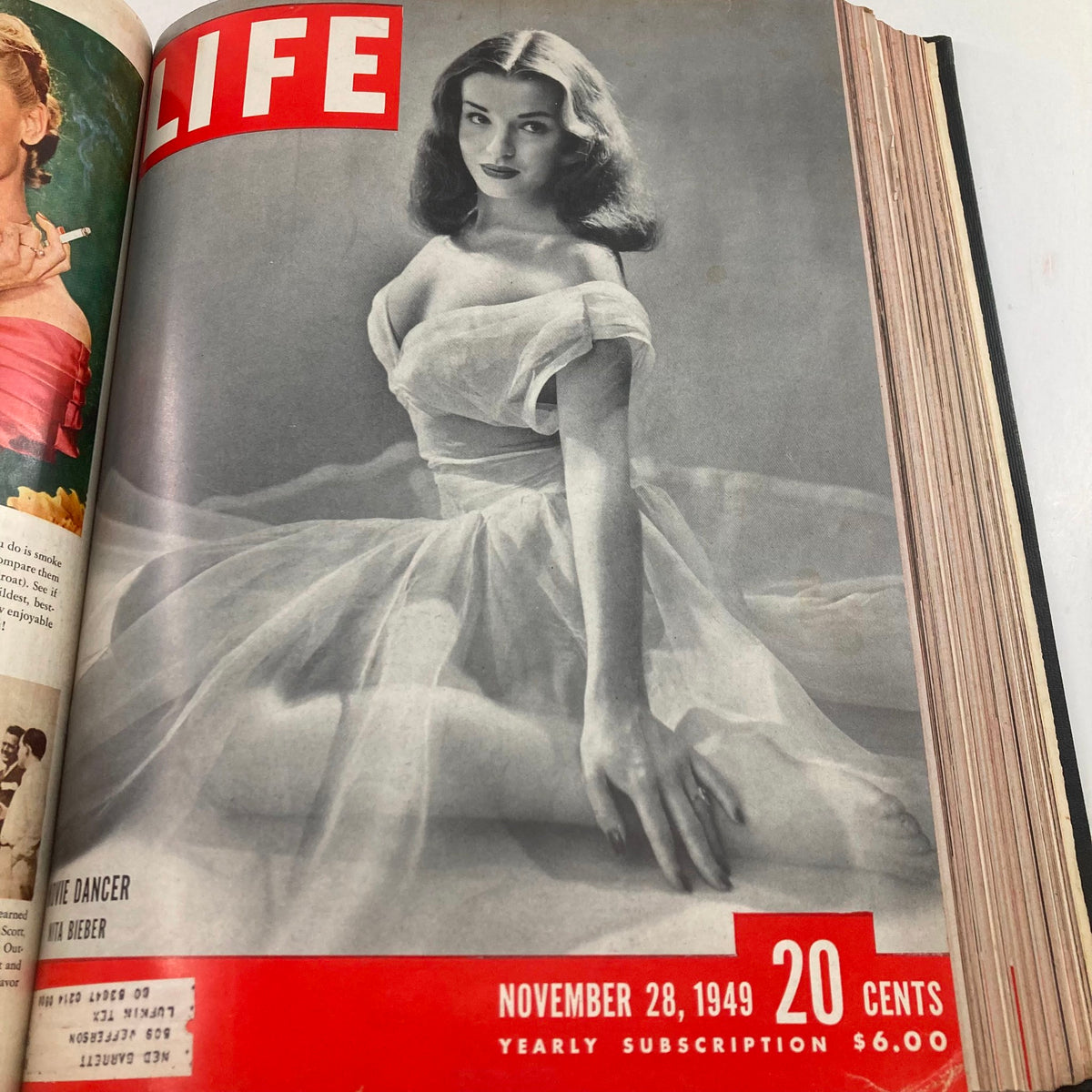 Cover of VTG 1949 Bound Life Magazine showcasing a model in a flowing dress, from the November 28, 1949 issue, highlighting beauty and fashion.