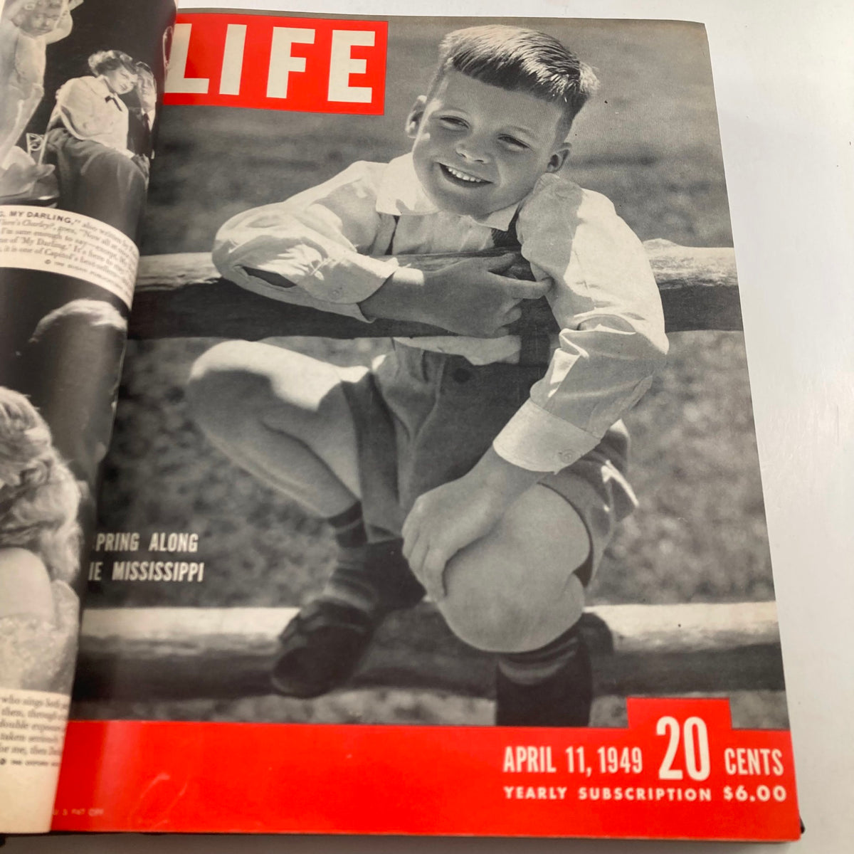 VTG 1949 Bound Life Magazine cover from April 11, 1949, showcasing a smiling boy with the headline 'Spring Along the Mississippi'.