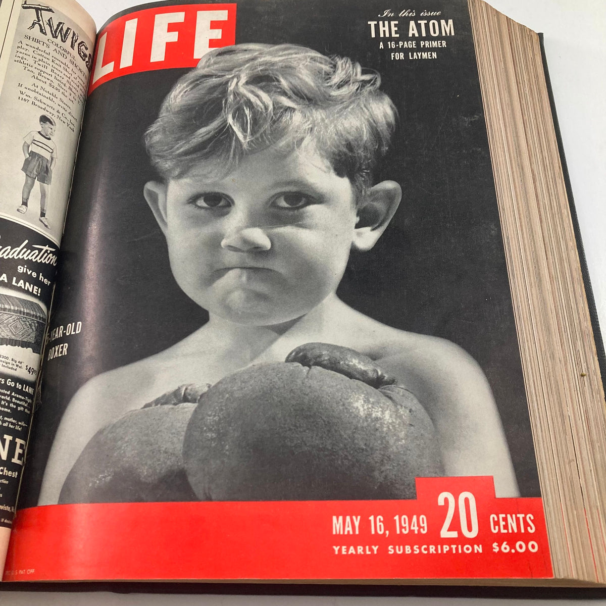 Cover of VTG 1949 Bound Life Magazine from May 16, 1949, displaying a serious child boxer holding fruits, underlining themes of childhood.