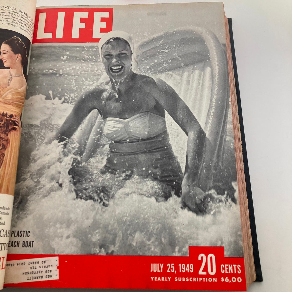 Cover of VTG 1949 Bound Life Magazine featuring a woman enjoying the beach, July 25, 1949 issue, representing summer fun in mid-century America.