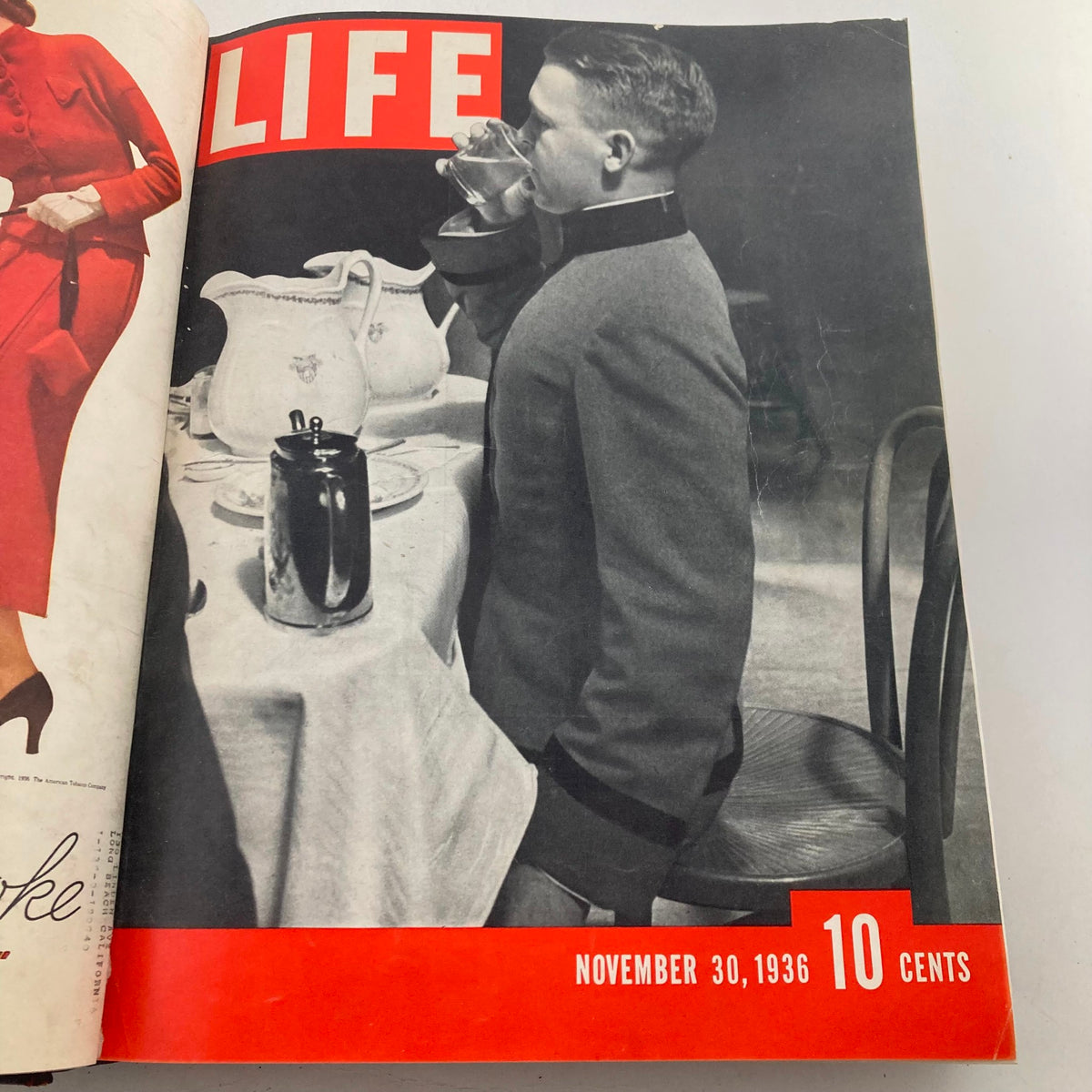 Cover of the November 30, 1936 issue of VTG 1936 1937 First Issue Bound Life Magazine featuring a dining scene with a soldier.