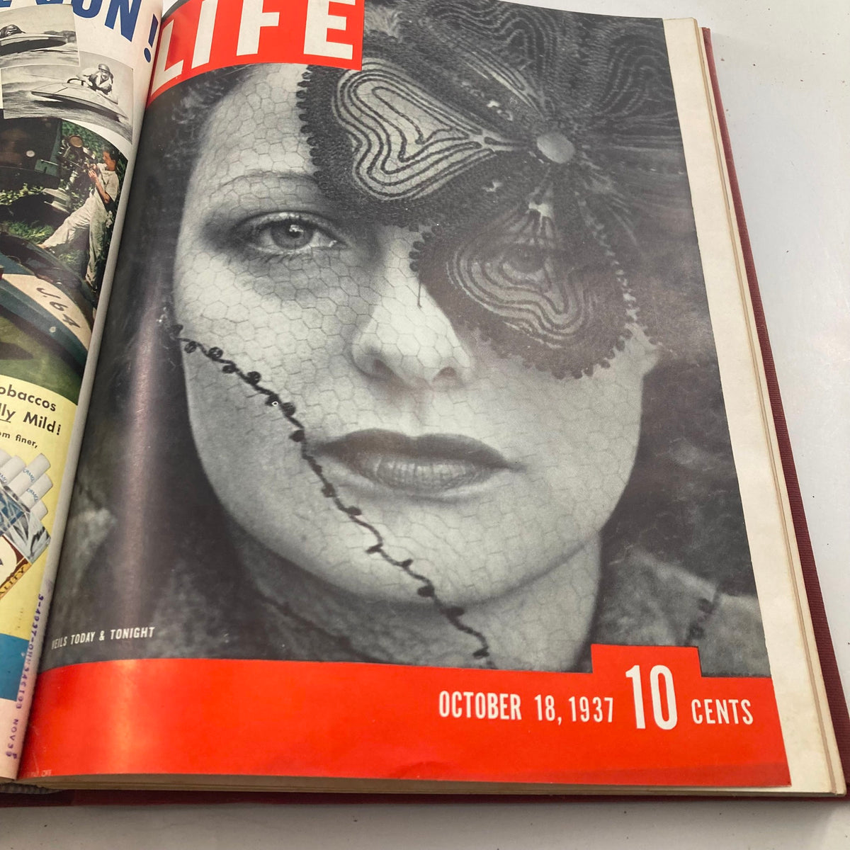 Cover of VTG 1937 Bound Life Magazine displaying a striking portrait of a woman in elegant attire with a decorative hat, dated October 18, 1937.