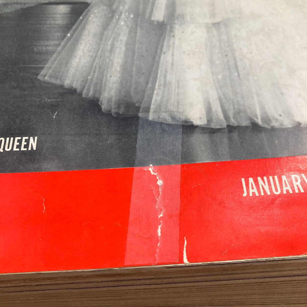 Close-up of the cover of VTG 1940 Bound LIFE Magazine showing a tear on the January 1, 1940 issue highlighting the design and historical significance.