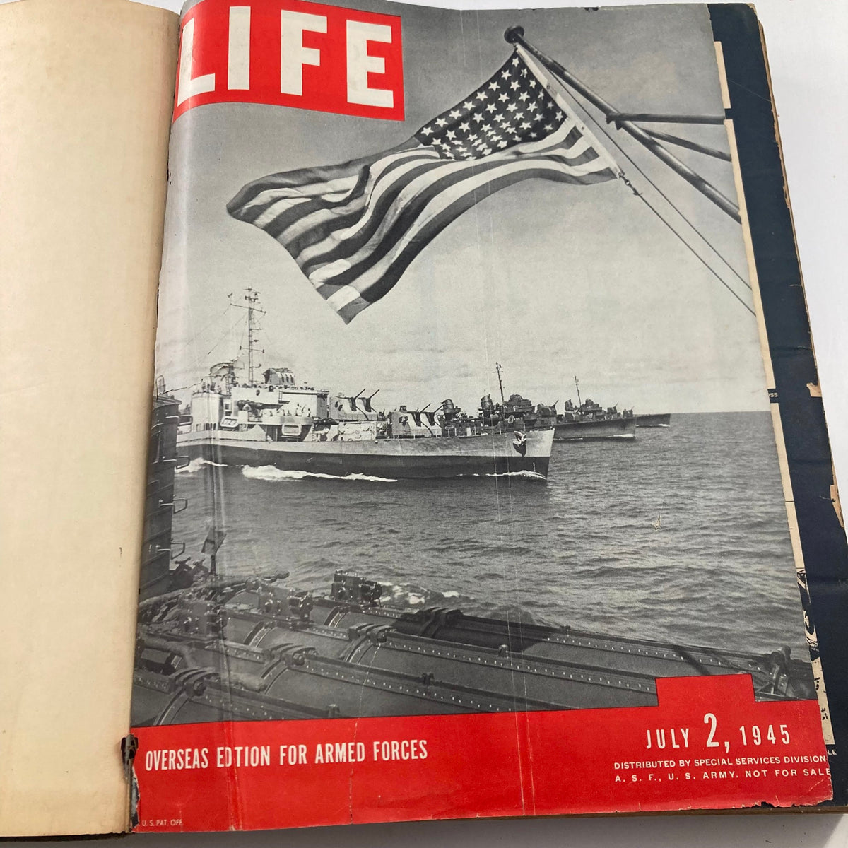 Inside page of VTG 1945 Bound Life Magazine featuring the cover of the July 2, 1945 issue with U.S. Navy ships and an American flag.