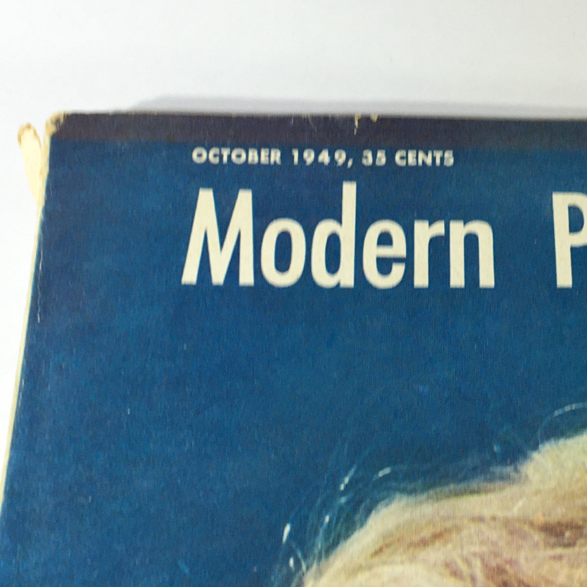 Close-up of the title 'Modern Photography' from the October 1949 magazine, highlighting vintage print design elements.