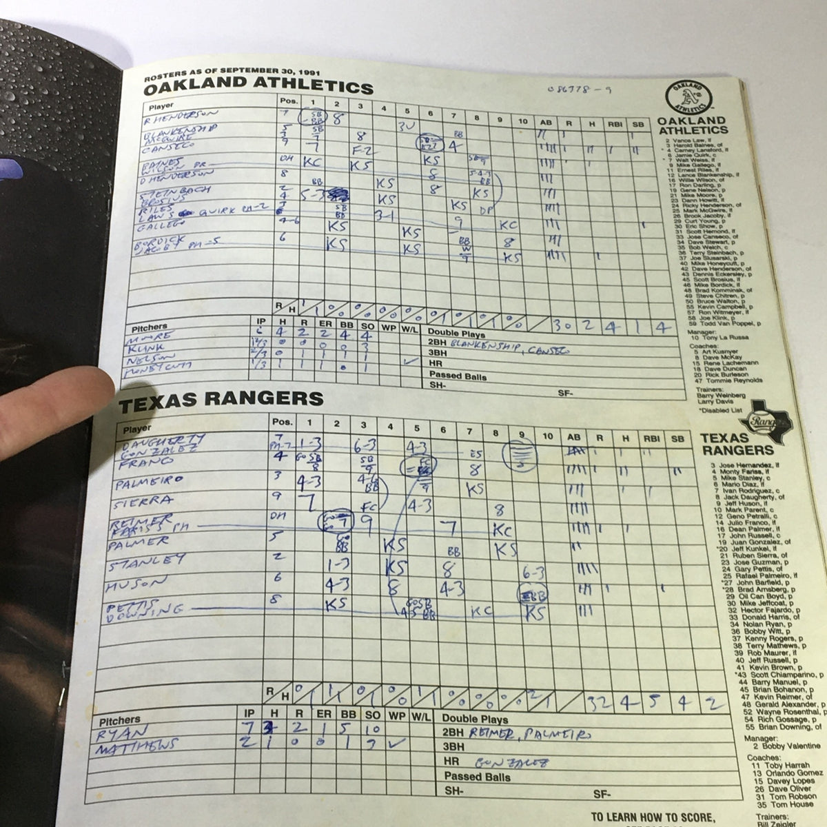1991 Souvenir Program Magazine scorebook page showing the Texas Rangers' game statistics against the Oakland Athletics, reflecting a piece of baseball heritage.