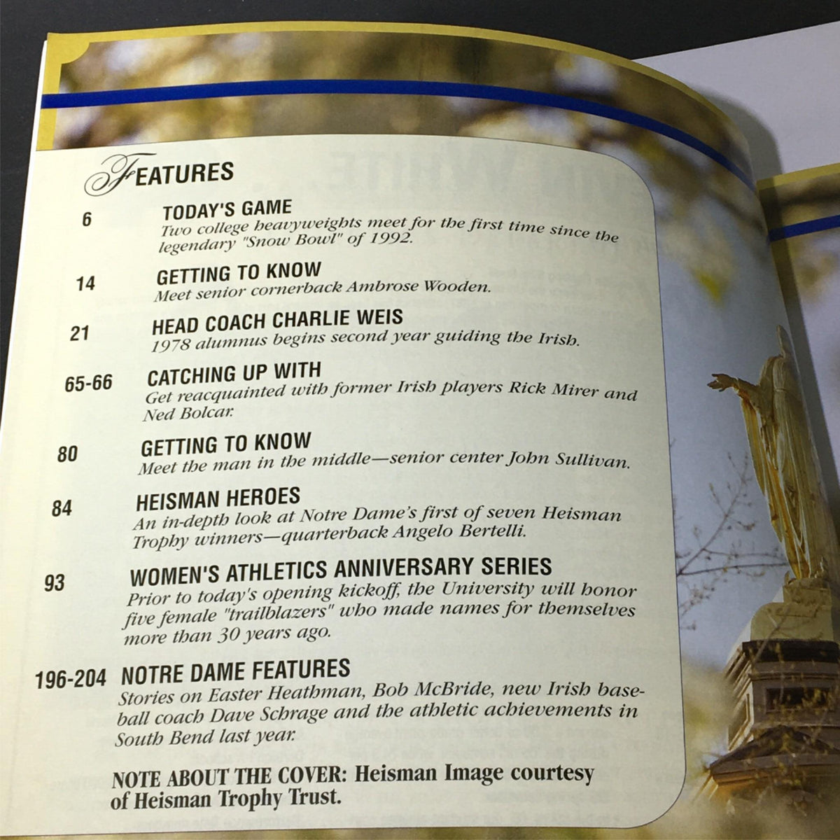 Inside page of Football Gameday Magazine highlighting features on the Notre Dame football team, including today's game analysis, coach profiles, and Heisman Trophy winners.