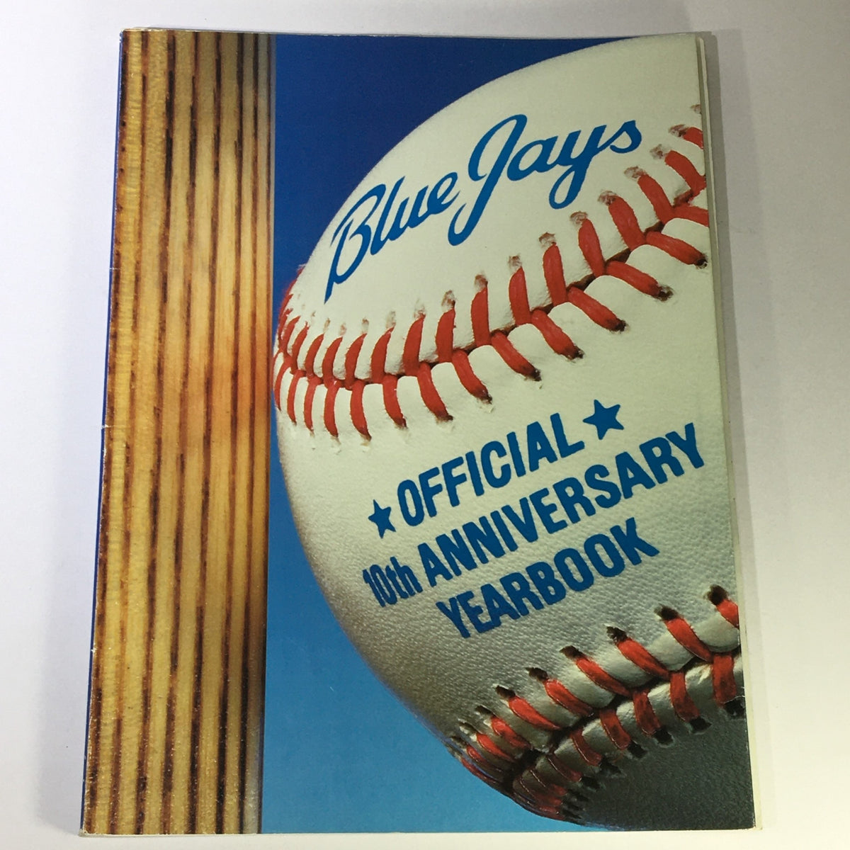 VTG MLB 1977-1986 Official Blue Jays Yearbook 10th Anniversary Special cover featuring a baseball and wooden bat design, celebrating a decade of Blue Jays history.
