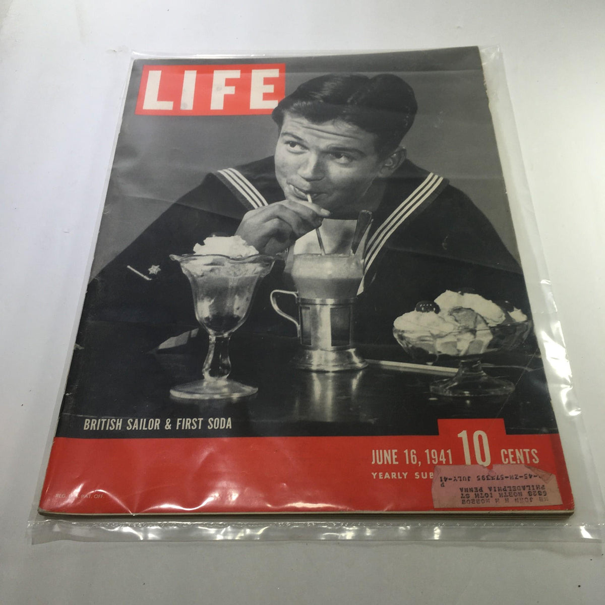 Life Magazine cover from June 16, 1941 featuring a British sailor enjoying soda, representing the theme 'British Sailor & First Soda'. The magazine highlights cultural moments of World War II.