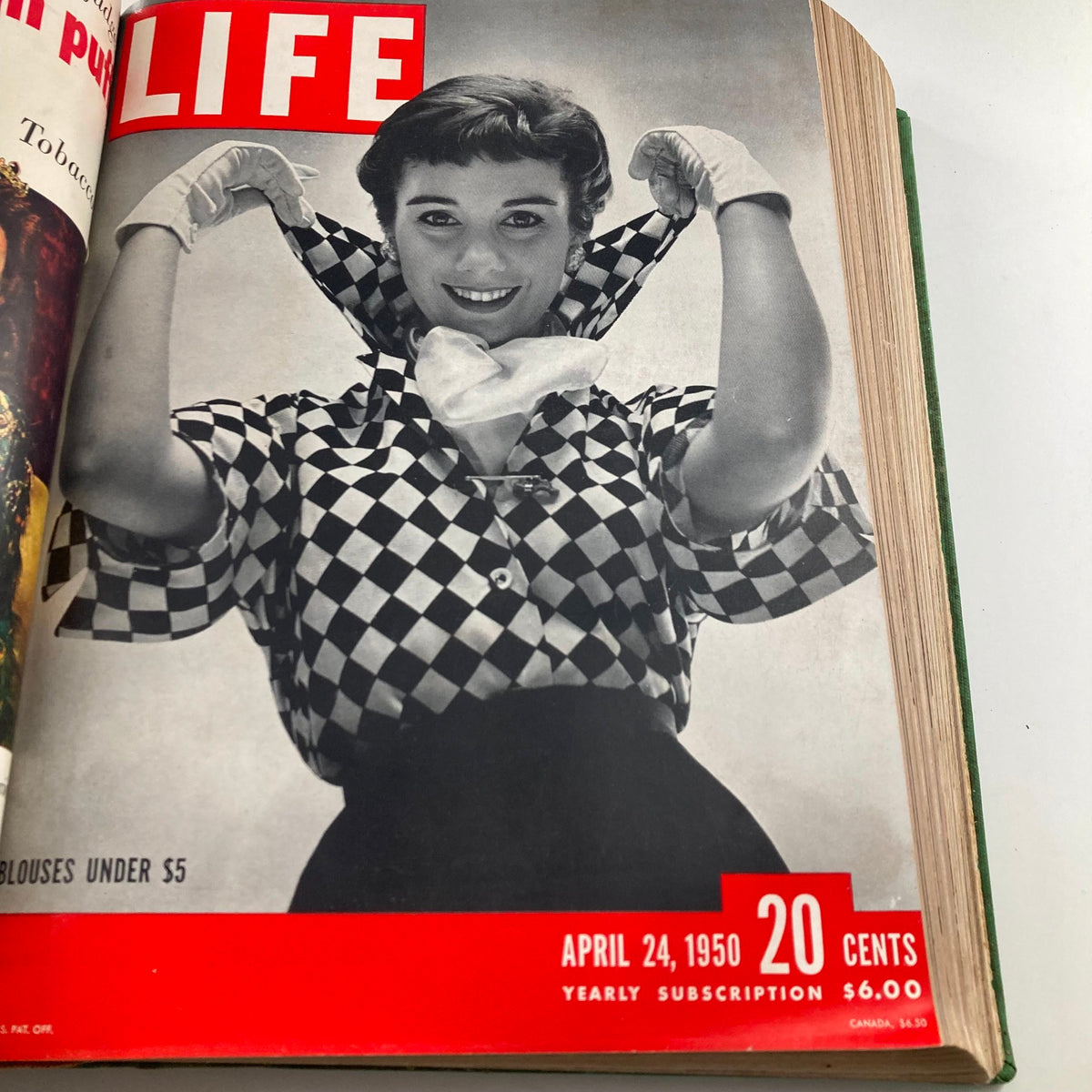 Vintage 1950 Bound Life Magazine April 24 issue highlighting a fashionable model wearing a blouse, showcasing styles from the 1950s fashion scene.