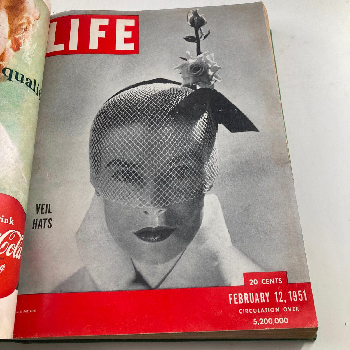 Cover of the VTG 1951 Bound Life Magazine showcasing a model wearing a veil hat on February 12, 1951, highlighting fashion trends of the time.