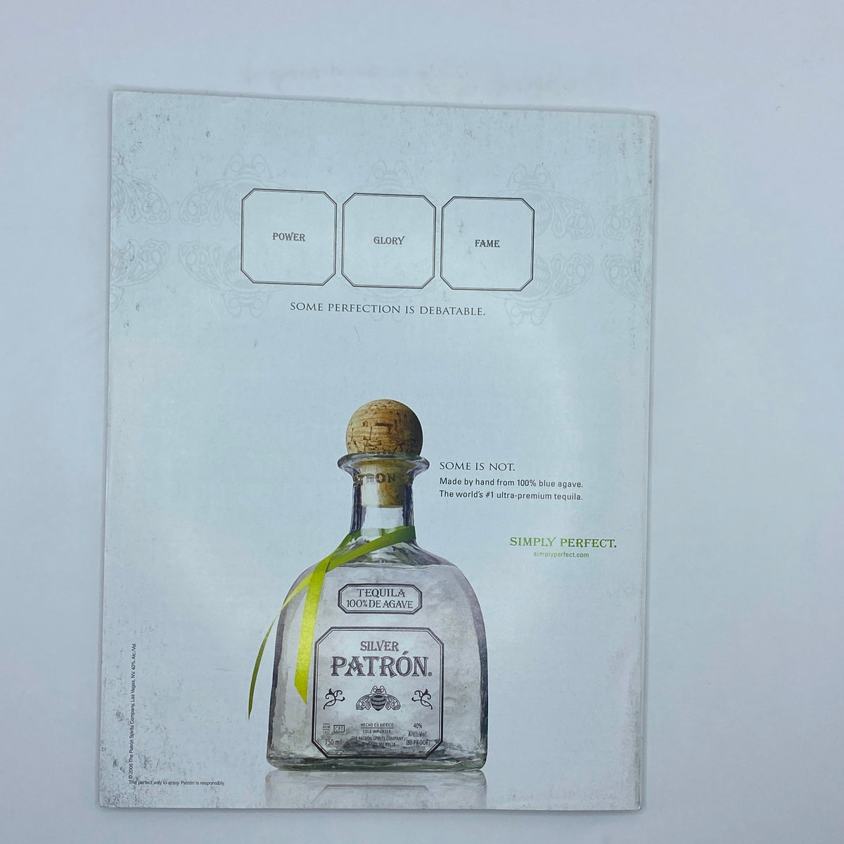 Back cover of Fortune Magazine October 2, 2006, featuring an advertisement for Patron Tequila, emphasizing themes of power, glory, and fame.