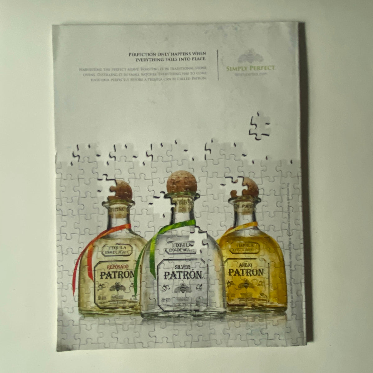 An artistic representation of Patron tequila bottles on a puzzle background, accompanying the Fortune Magazine September 2, 2013 issue titled 'The Gray Art of Insider Trading'. This visual enhances the theme of business and finance discussed in the magazine.