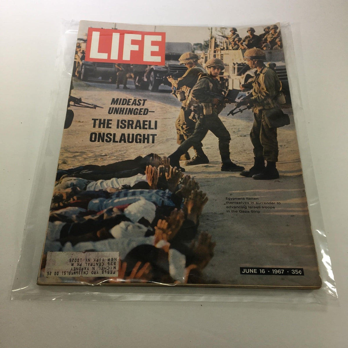 Cover of Life Magazine dated June 16, 1967, titled 'MidEast Unhinged: The Israeli Onslaught,' featuring Israeli soldiers in a military context and the figures of civilians on the ground, capturing a historical moment in Middle Eastern conflicts.