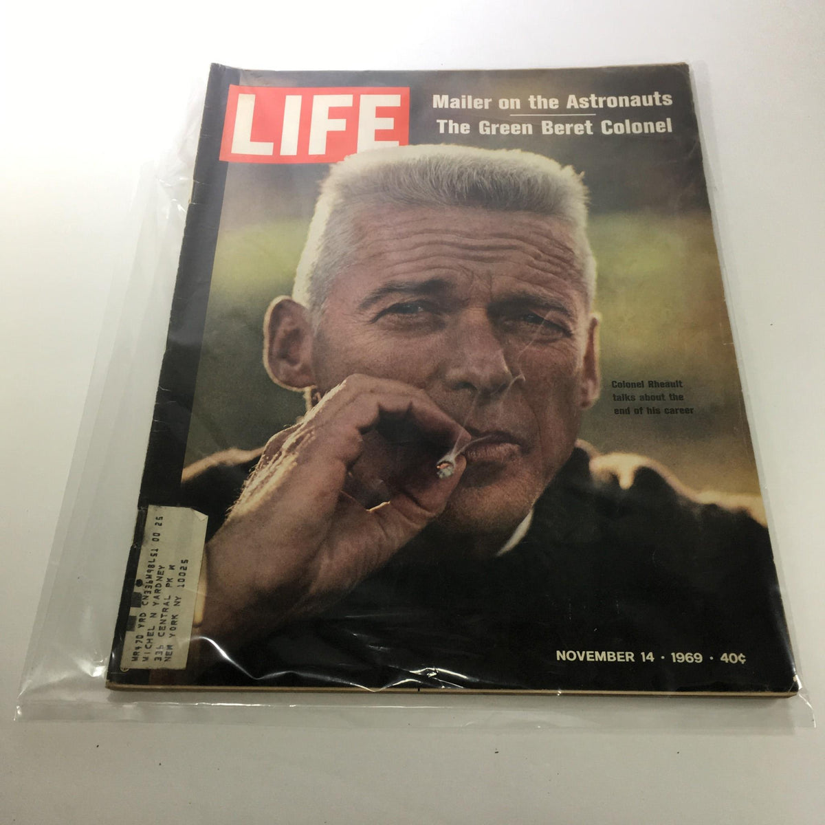 Cover of Life Magazine from November 14, 1969, featuring Colonel Rheult, the Green Beret Colonel, showcasing military life during the late 1960s, with a striking portrait of Colonel Rheult smoking a cigarette.