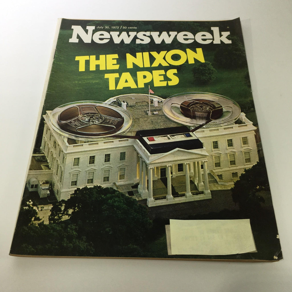 Vintage Newsweek Magazine cover from July 30, 1973, featuring 'The Nixon Tapes' with an aerial view of the White House and reel-to-reel tape recorders, reflecting the historical context of the Watergate scandal.
