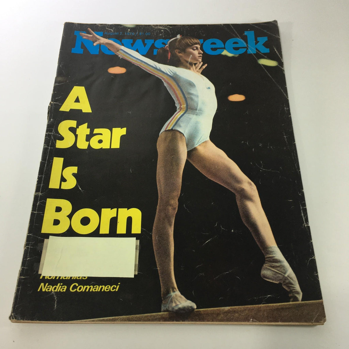 Cover of Newsweek Magazine from August 2, 1976, featuring the title 'A Star Is Born' alongside a striking image of Romanian gymnast Nadia Comaneci in action at the 1976 Summer Olympics.
