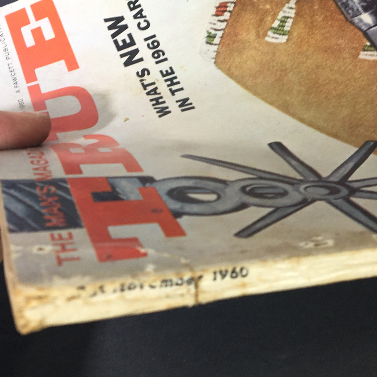 Close-up of the spine of VTG True The Man's Magazine November 1960, Volume 41 displaying the publication date and title prominently.