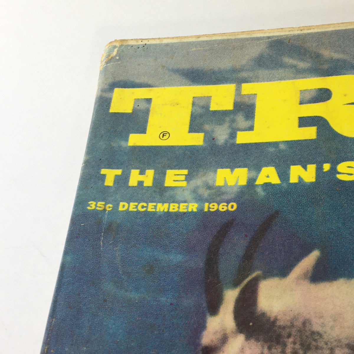 Close-up of the title and date on the cover of VTG True: The Man's Magazine December 1960 showing 'The Man's Magazine' and a 35-cent price tag.
