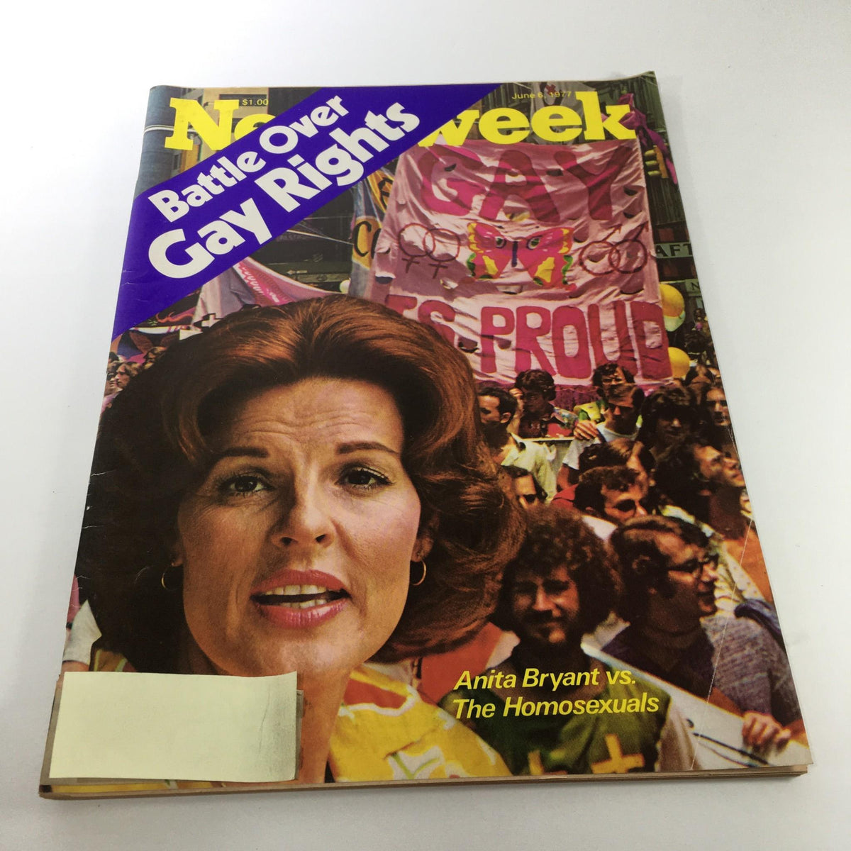 Cover of Newsweek Magazine dated June 6, 1977, featuring the title 'Anita Bryant vs The Homosexuals' with a focus on the battle over gay rights, including protest imagery in the background and an image of Anita Bryant.